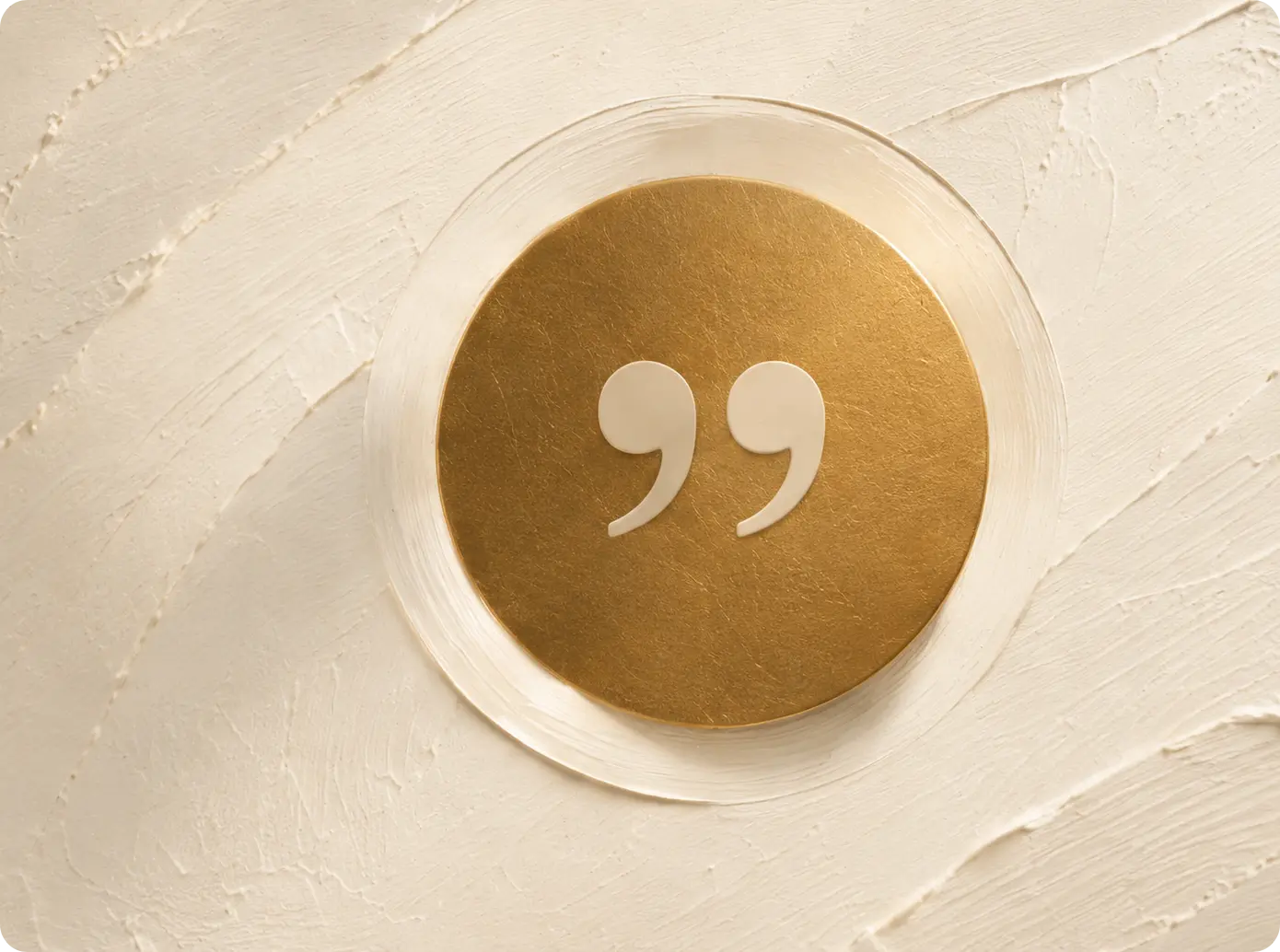 Gold quotation mark icon on a textured beige background